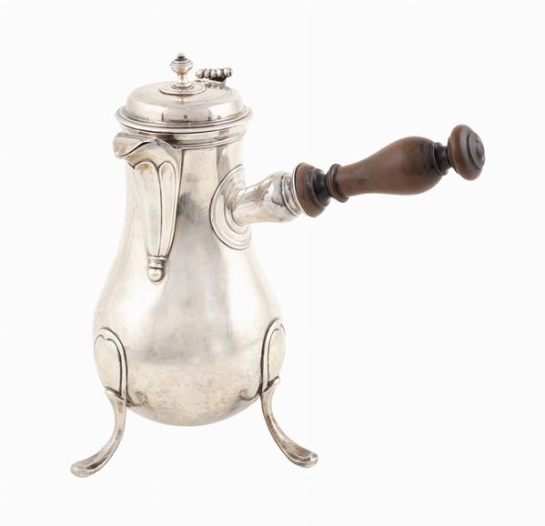 A silver chocolate pot