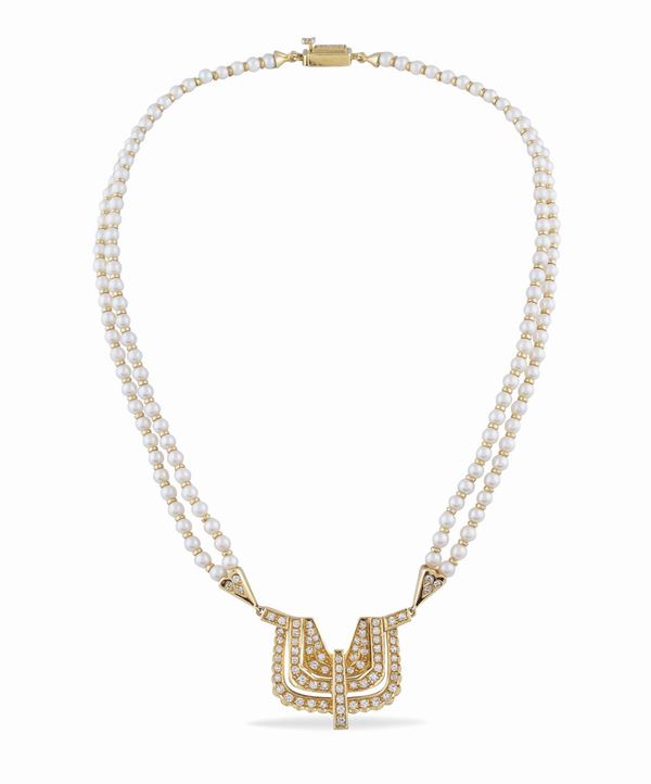 A two-pearls-strend collier
