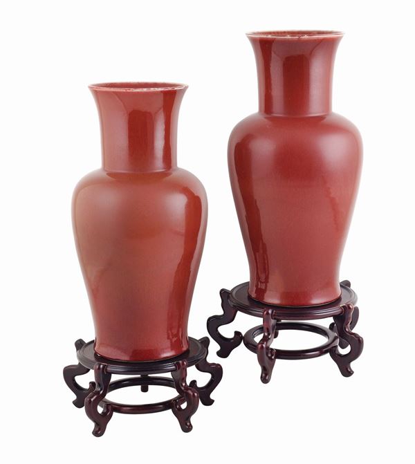 A pair of red porcelain vases