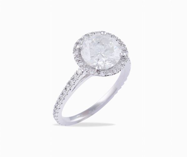 Anello solitario in oro bianco 14kt e diamante