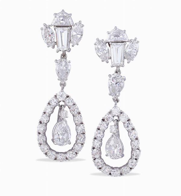 A pair of 18kt white gold pendant earrings and diamonds