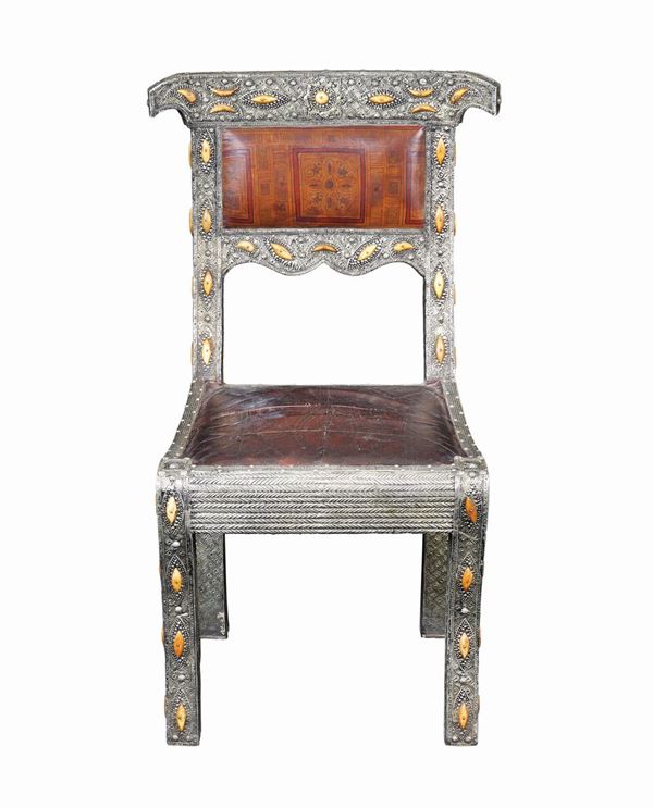 A silver plate chair