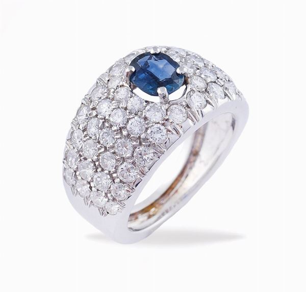 Anello a fascia in oro bianco 18kt e diamanti