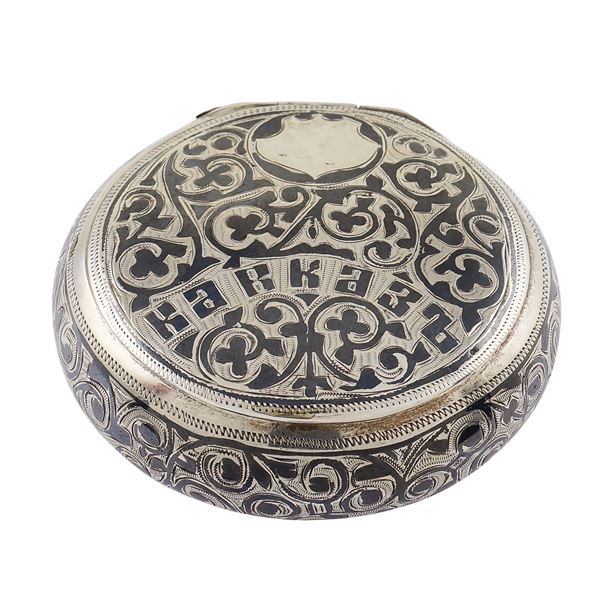 A circular niello silver box