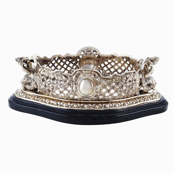 An oval silver centerpiece