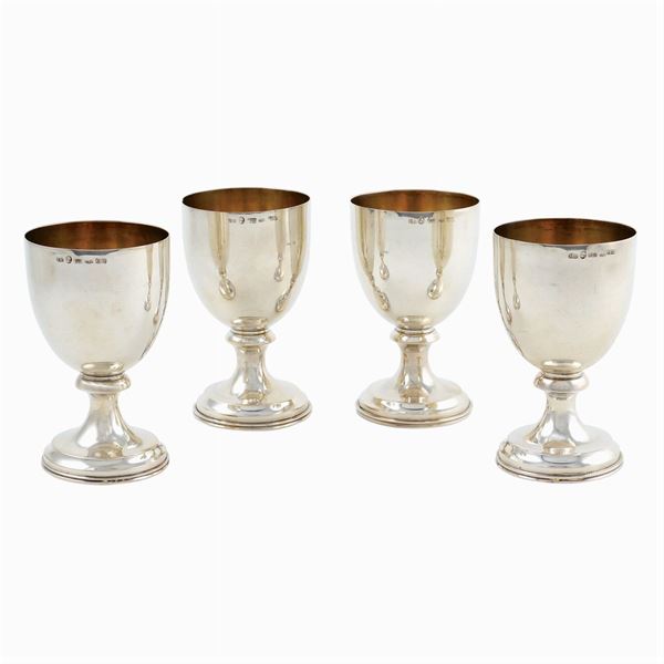 Four silver glasses