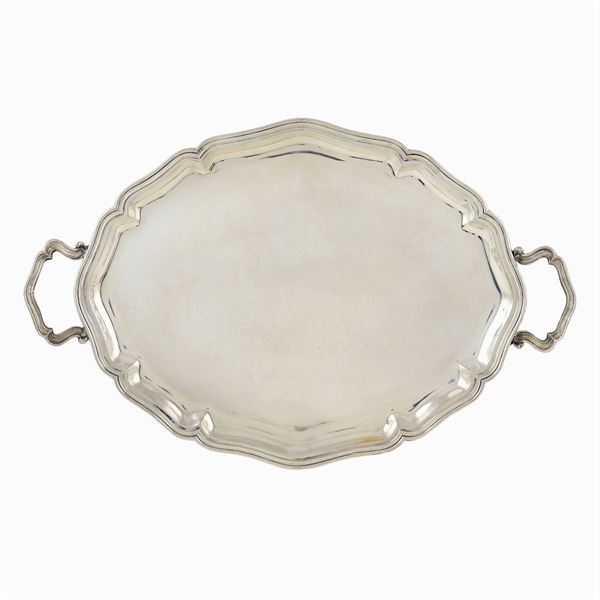 A silver tray with two handles