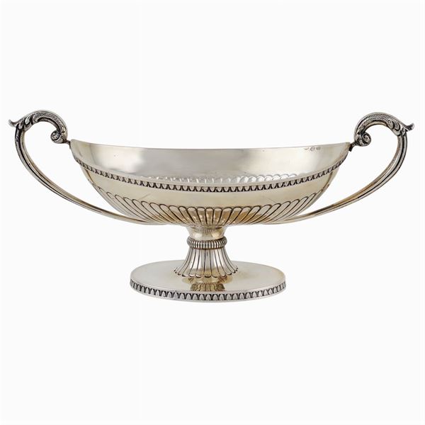A silver stand with two handles