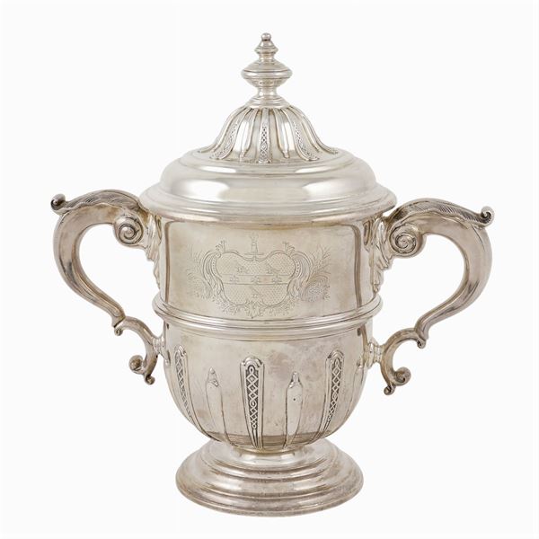 A silver cup with two handles