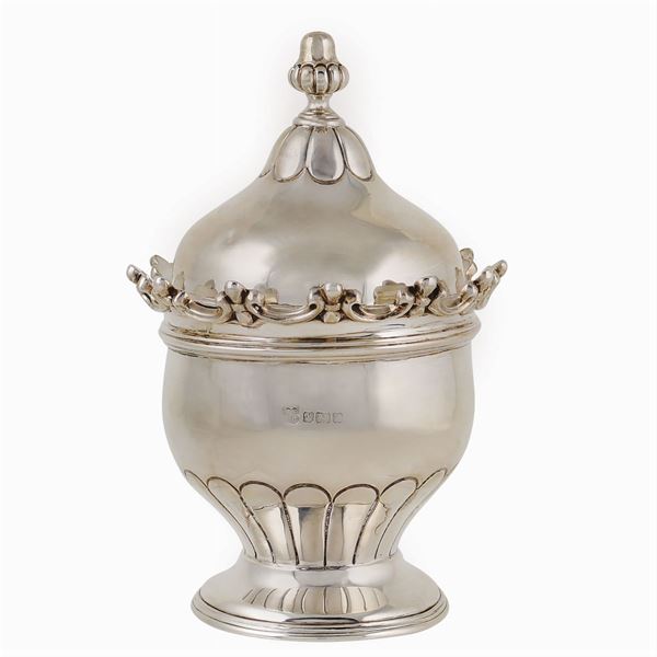 A silver sugar bowl