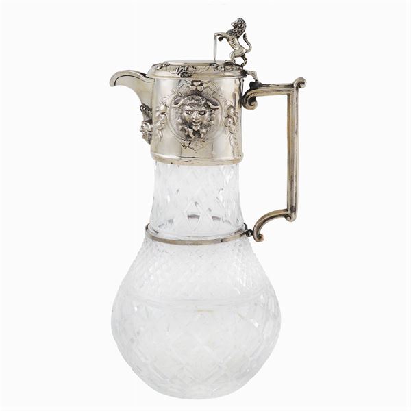 A pair of crystal and silver spouts