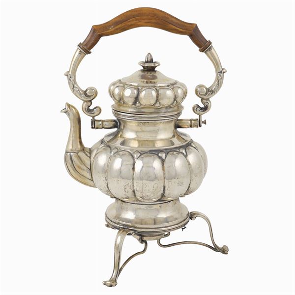 A silver tea kettle