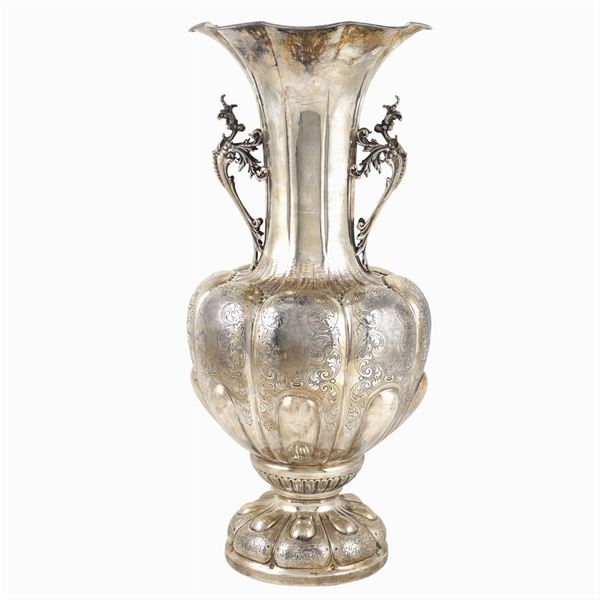 An important silver vase with two handles