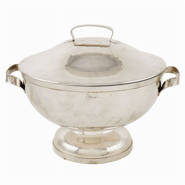 A silver tureen with two handles