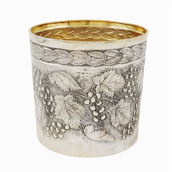 A silver ice bucket