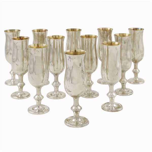 Dodici flutes in argento