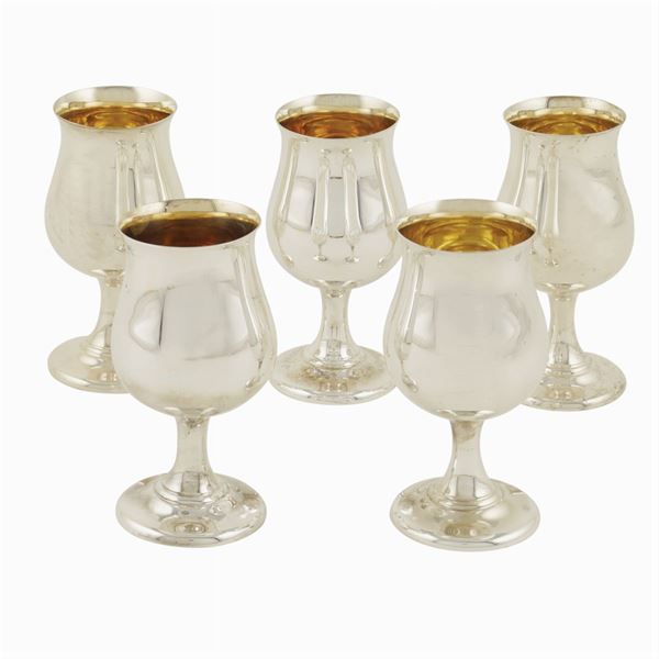 Five silver glasses