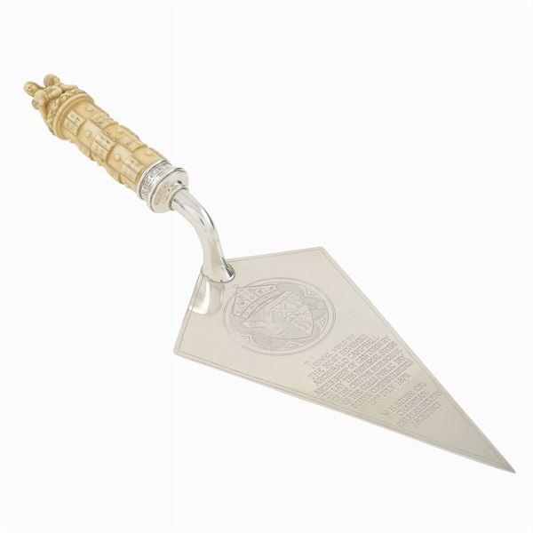 A silver and ivory trowel