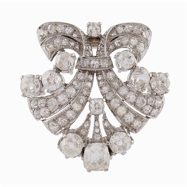 G. Petochi, spilla clips in platino e diamanti