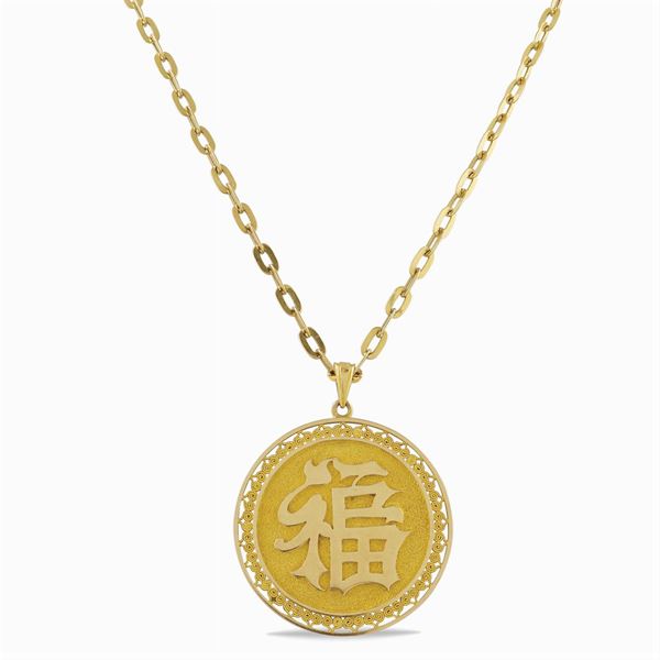 An 18kt gold pendant