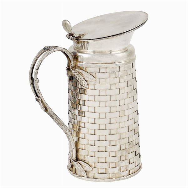 A silver thermal carafe