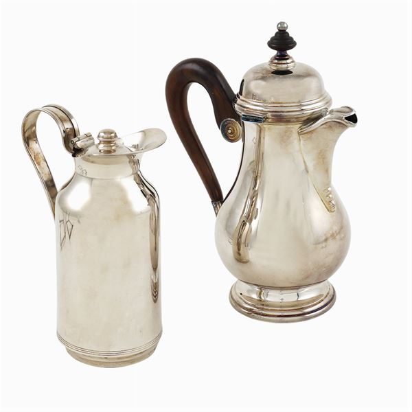 A silver coffeepot and a thermal carafe