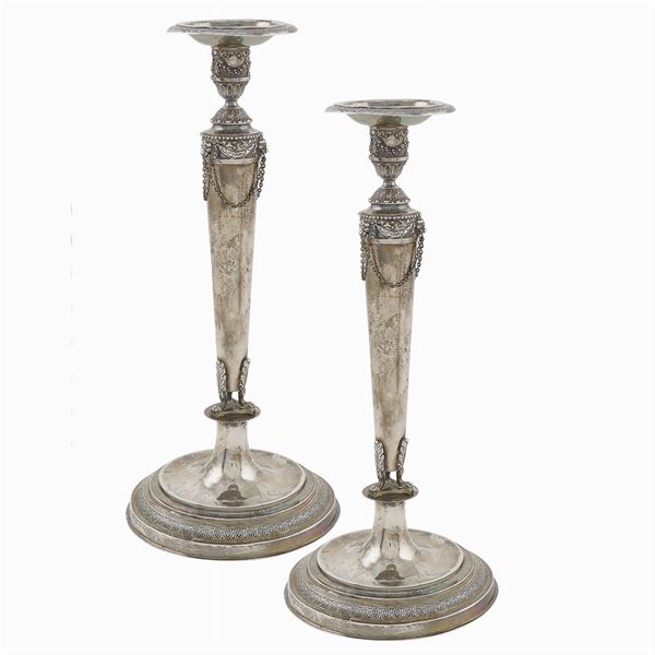 A pair of silver candelabra