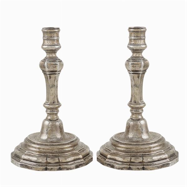 A pair of silver chandlesticks