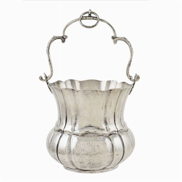 A silver holy water bucket