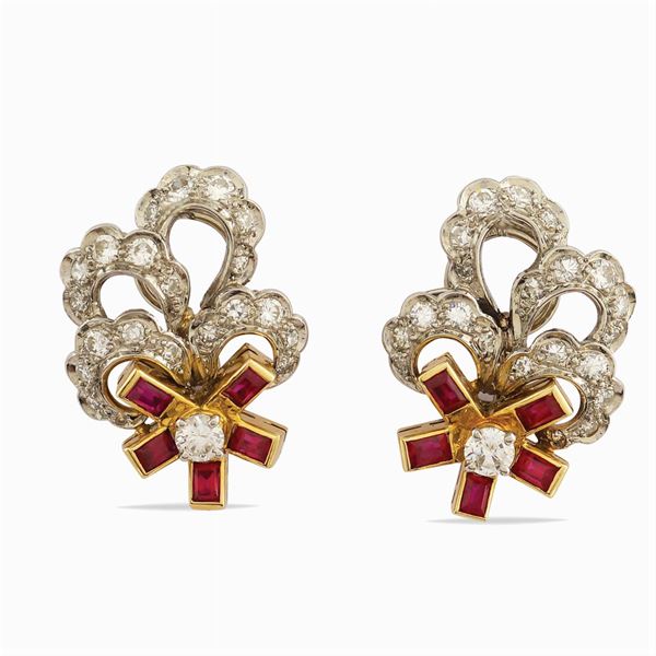 A pair of floral shaped earrings