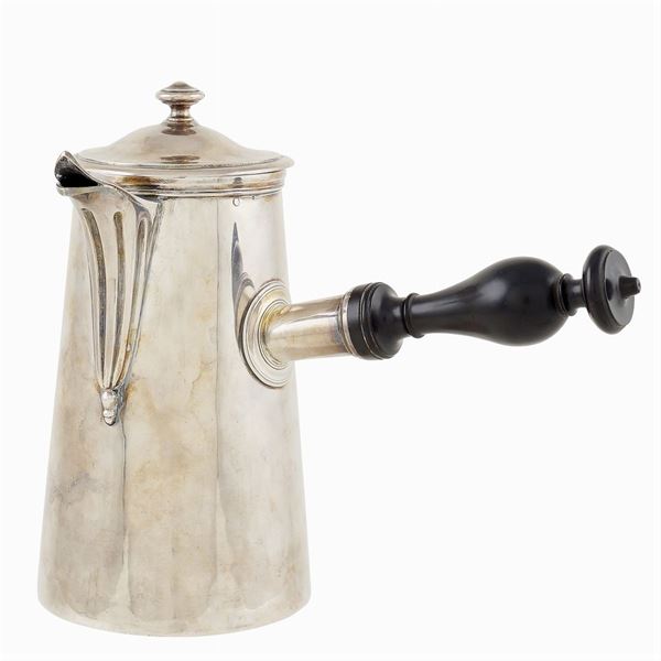 A silver chocolate kettle