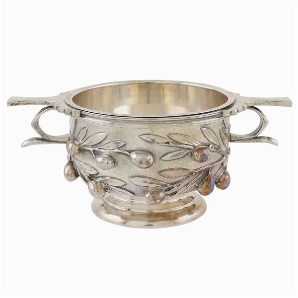 A silver cup with two handles