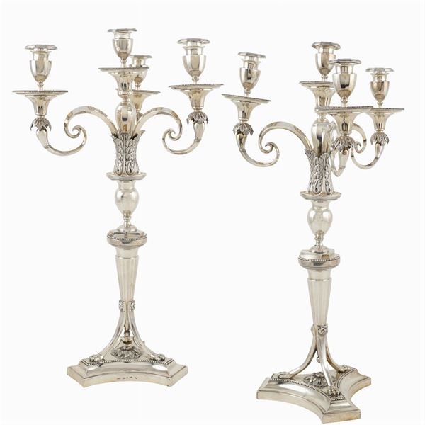 Coppia di candelabri Impero in argento a quattro fiamme