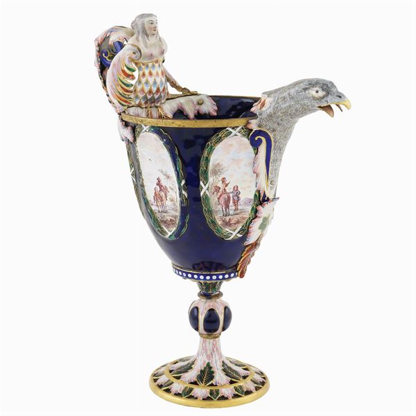 A gilt metal and polychromatic enamel spout