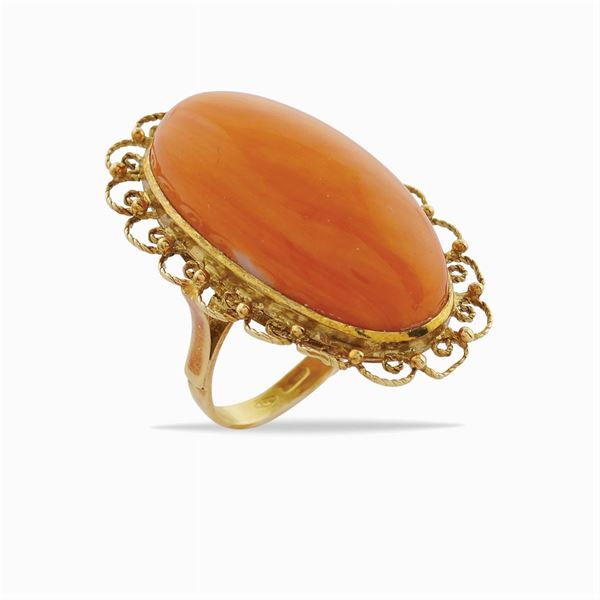 An 18kt gold ring with mediterranean coral
