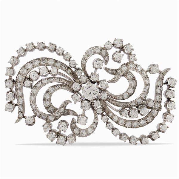 Spilla nastro in oro bianco 18kt e diamanti