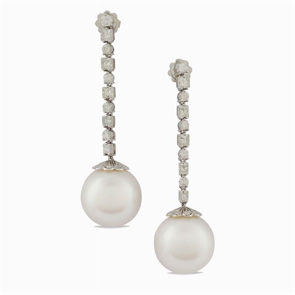 A pair of 18kt white gold earrings and South Sea pearls