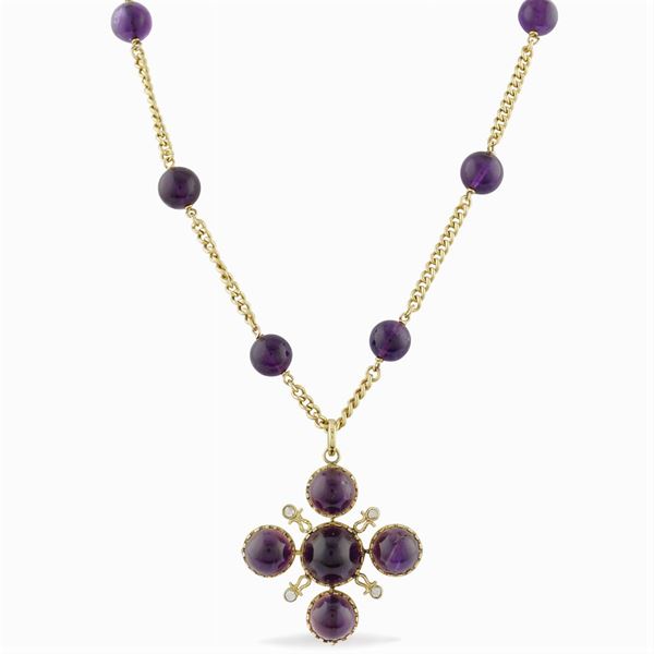 An 18kt gold necklace and amethysts
