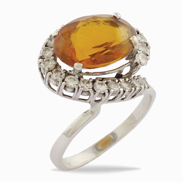An 18kt white gold ring with a citrine topaz