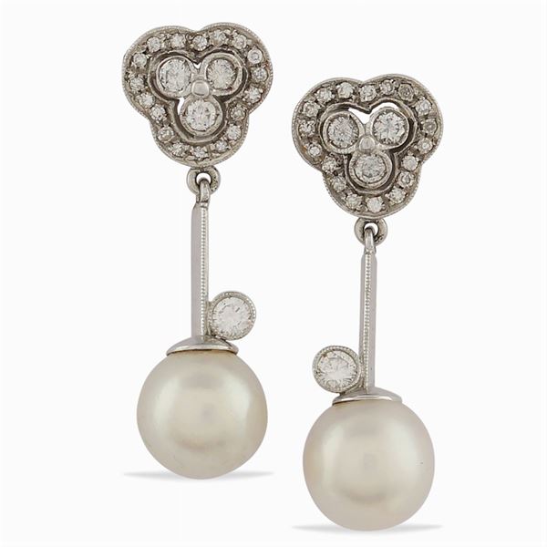 Orecchini pendenti in oro bianco e giallo 18kt