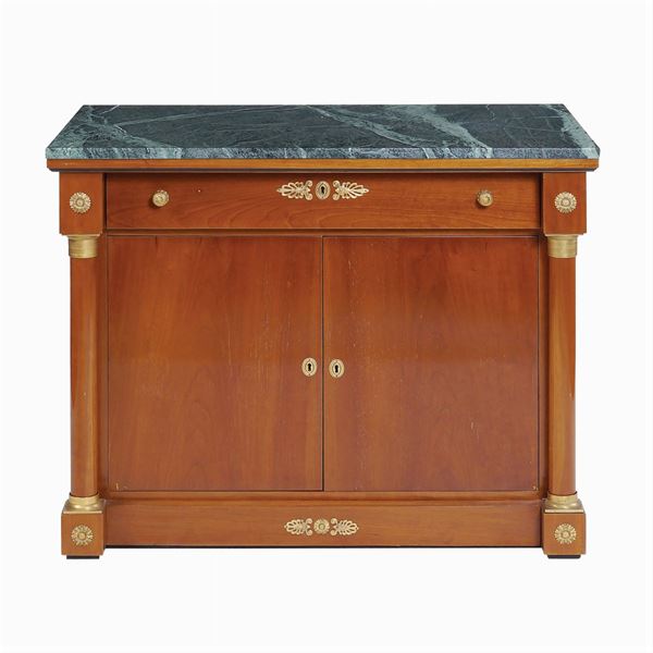 An Empire style cherry wood furniture