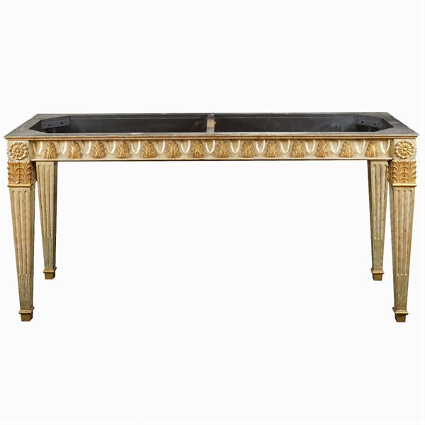 A lacquered and gilt wood console