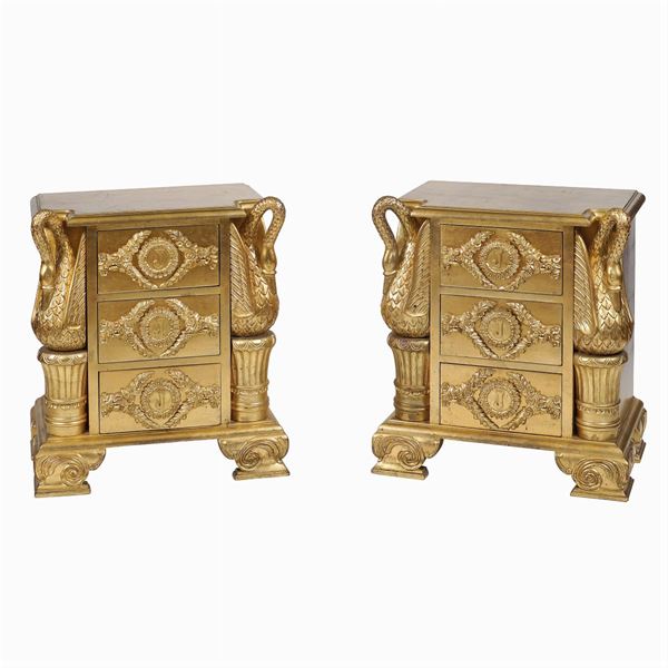 A pair of Empire style night tables