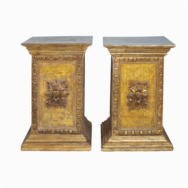 A pair of wood bases