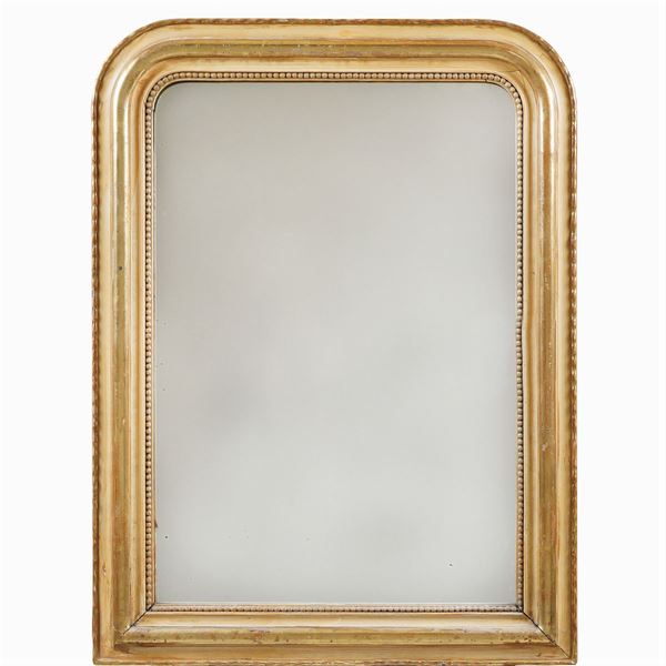 A gilt wood and lacquered mirror