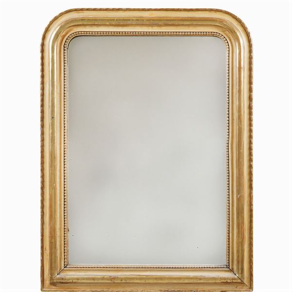 A gilt wood and lacquered mirror