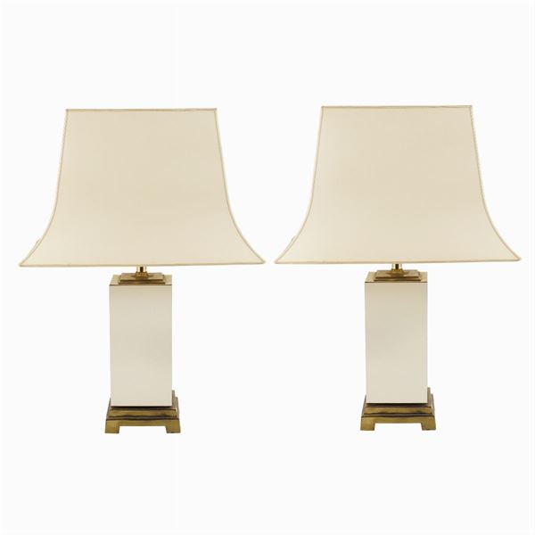 A pair of gilt metal lamps