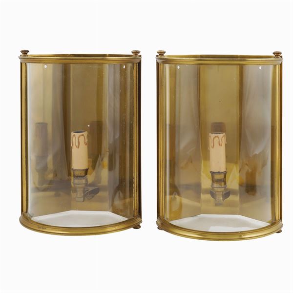 A pair of gilt metal and glass appliques