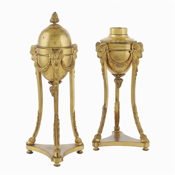 A pair of golden bronze cassolettes