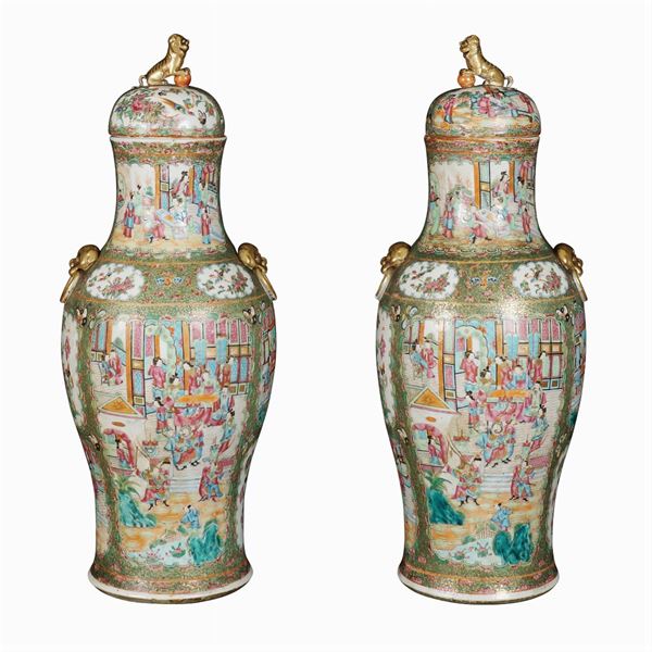 A pair of polychrome Canton porcelain vases